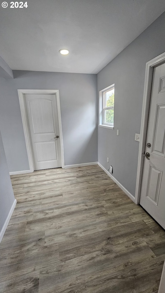 empty room featuring wood-type flooring