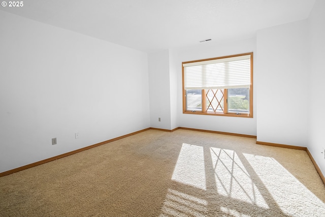 view of carpeted spare room