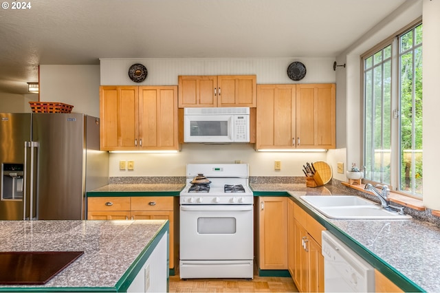 1650 Leatherwood Dr, Eugene, OR 97405 - kitchen with light brown cabinetry, a sink, tile counters, and white appliances