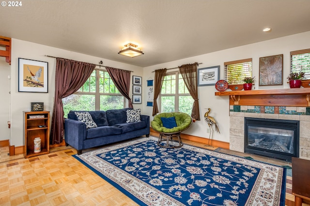 1650 Leatherwood Dr, Eugene, OR 97405 - living area with a tiled fireplace and baseboards