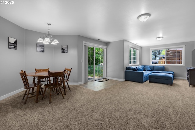 1820 Huckleberry Dr, Seaside, OR 97138 - dining space featuring a chandelier, carpet flooring, and baseboards