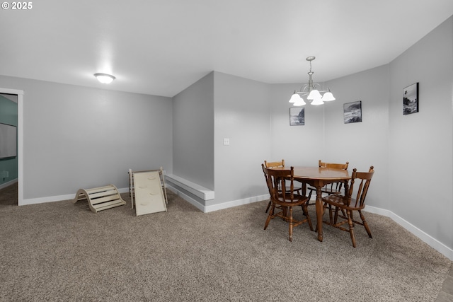 1820 Huckleberry Dr, Seaside, OR 97138 - dining area with baseboards, carpet flooring, and a chandelier