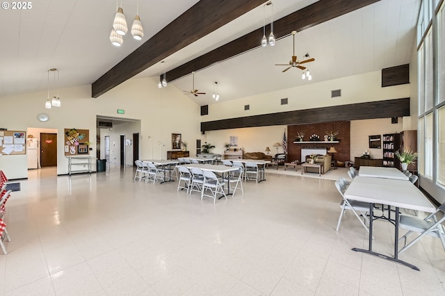 863 NE Fleming Ave Unit B-10, Gresham, OR 97030 - dining area with ceiling fan, beamed ceiling, and high vaulted ceiling