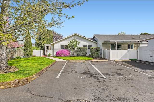 863 NE Fleming Ave Unit B-10, Gresham, OR 97030 - view of front of home with uncovered parking and a gate