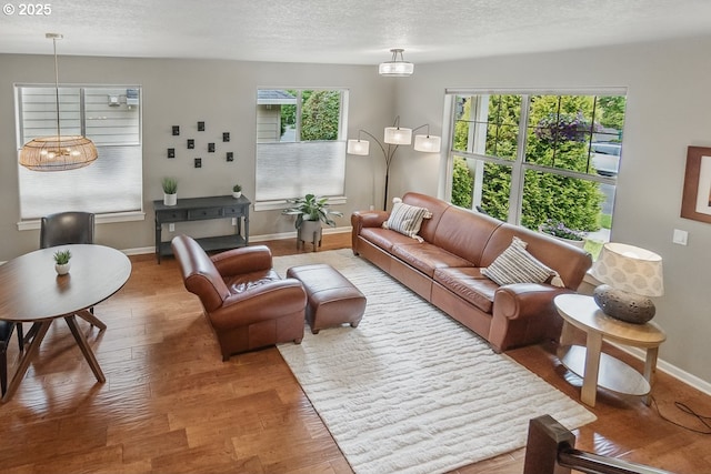 418 SW 140th Ave, Beaverton, OR 97006 - living area featuring wood finished floors and a textured ceiling
