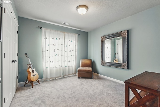 418 SW 140th Ave, Beaverton, OR 97006 - living area featuring carpet floors and a textured ceiling