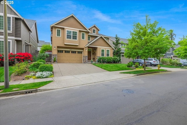 14931 SW 88th Ave, Tigard, OR 97224 - craftsman-style home with an attached garage, driveway, and stone siding