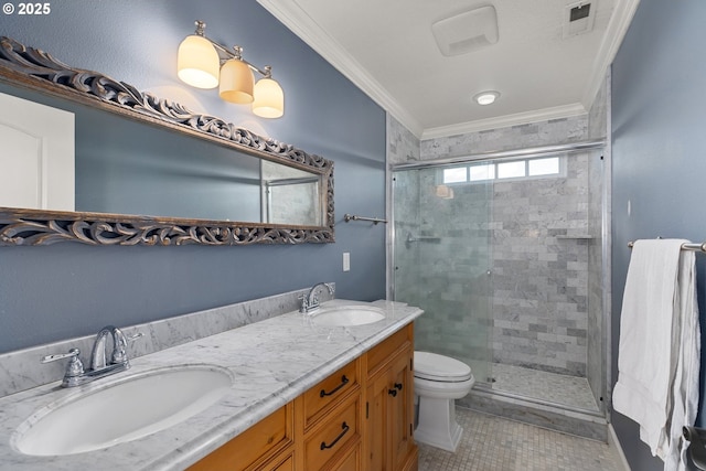 bathroom featuring vanity, tile patterned floors, a shower with door, and crown molding