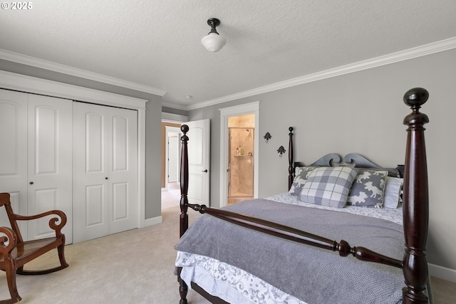 bedroom with ensuite bathroom, light colored carpet, ornamental molding, and a closet