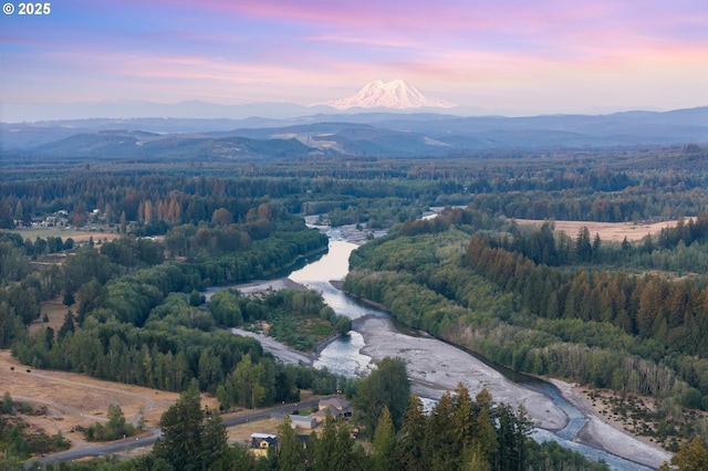 aerial view at dusk with a mountain view