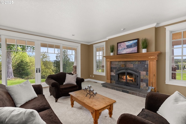 living room featuring a fireplace, carpet floors, and ornamental molding