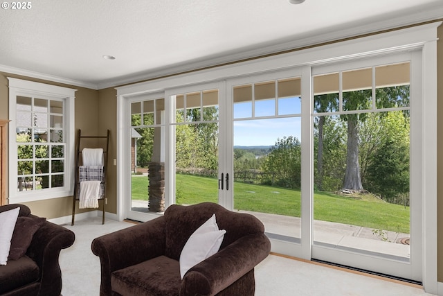 doorway to outside featuring ornamental molding