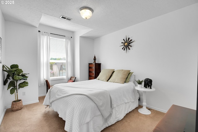 12909 SW Jacob Ct, Portland, OR 97224 - bedroom featuring carpet floors, baseboards, and a textured ceiling