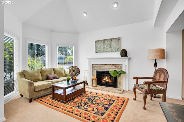 12909 SW Jacob Ct, Portland, OR 97224 - living area featuring carpet floors, healthy amount of natural light, a fireplace, vaulted ceiling, and recessed lighting