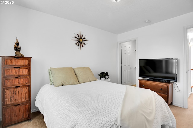12909 SW Jacob Ct, Portland, OR 97224 - bedroom featuring light carpet and baseboards