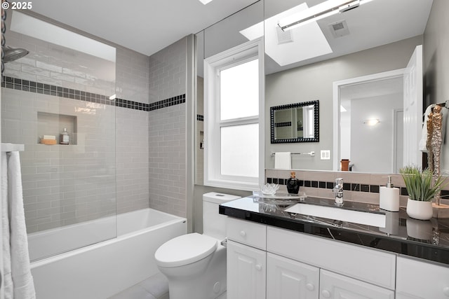 12909 SW Jacob Ct, Portland, OR 97224 - full bathroom with vanity, bathing tub / shower combination, toilet, and tile patterned floors