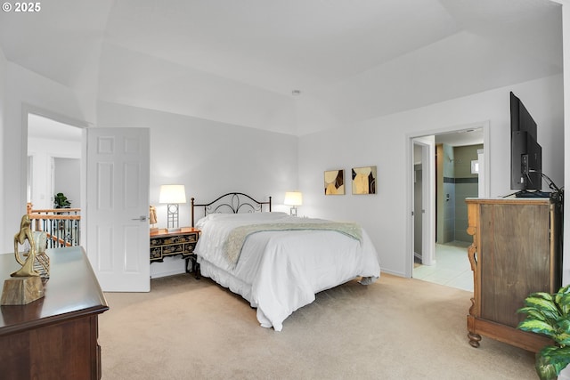 12909 SW Jacob Ct, Portland, OR 97224 - bedroom featuring light colored carpet, lofted ceiling, and ensuite bath