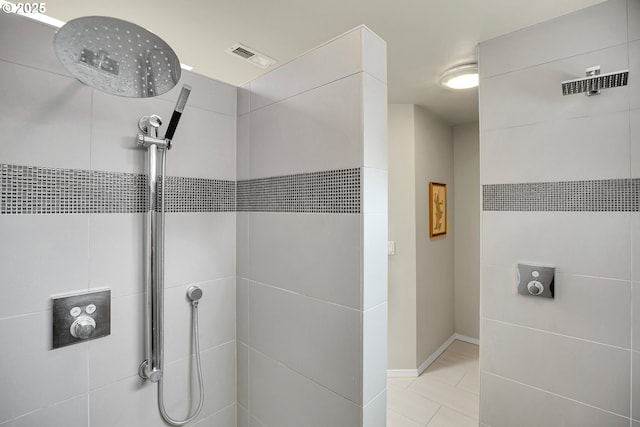 12909 SW Jacob Ct, Portland, OR 97224 - full bathroom featuring tiled shower and tile patterned floors