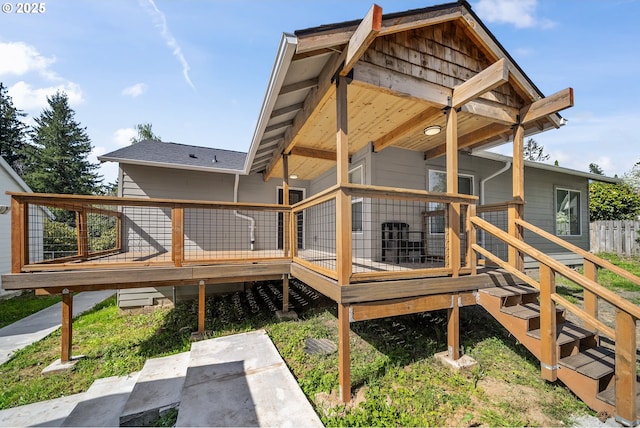 exterior space featuring stairs and a deck