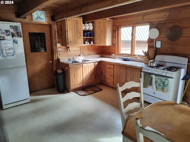60327 Lower Divide Rd, Joseph, OR 97846 - kitchen with white appliances, concrete flooring, a sink, light countertops, and open shelves