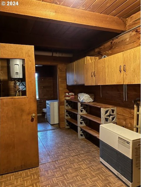 60327 Lower Divide Rd, Joseph, OR 97846 - storage room featuring heating unit and water heater