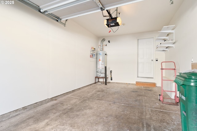 garage featuring a garage door opener and strapped water heater