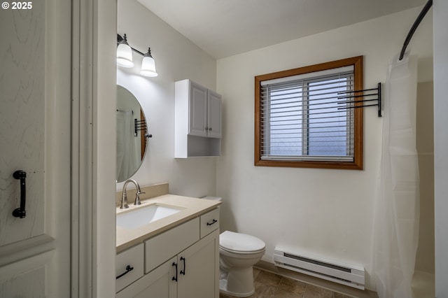 bathroom featuring a baseboard radiator, toilet, vanity, and curtained shower