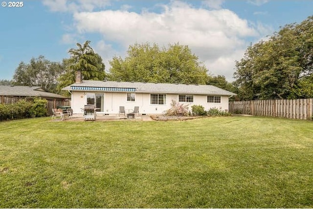 2040 Spruce Ave, Woodland, WA 98674 - rear view of house with a chimney and a patio