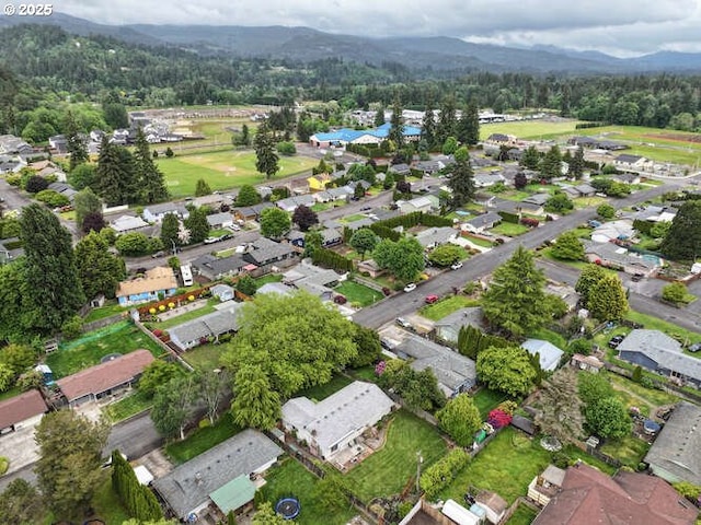 2040 Spruce Ave, Woodland, WA 98674 - aerial view of property's location with a mountain backdrop and nearby suburban area