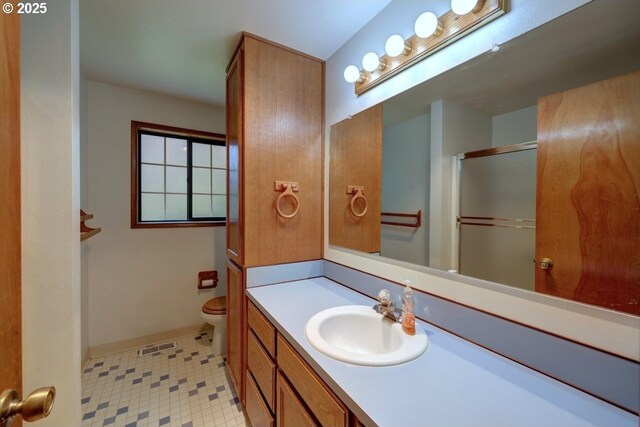 1630 SW 14th St, Warrenton, OR 97146 - bathroom with vanity and a shower with door