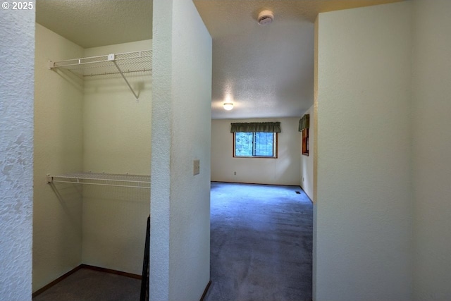 1630 SW 14th St, Warrenton, OR 97146 - hallway featuring a textured wall and carpet
