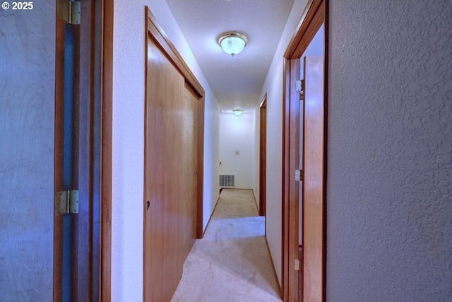 1630 SW 14th St, Warrenton, OR 97146 - hallway featuring light colored carpet