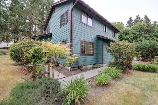 1630 SW 14th St, Warrenton, OR 97146 - view of property exterior featuring a yard