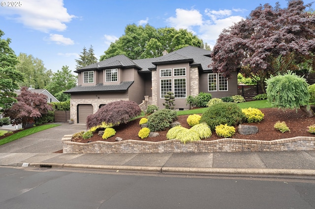 15137 SW Peachtree Dr, Portland, OR 97224 - view of front of house featuring asphalt driveway and a garage