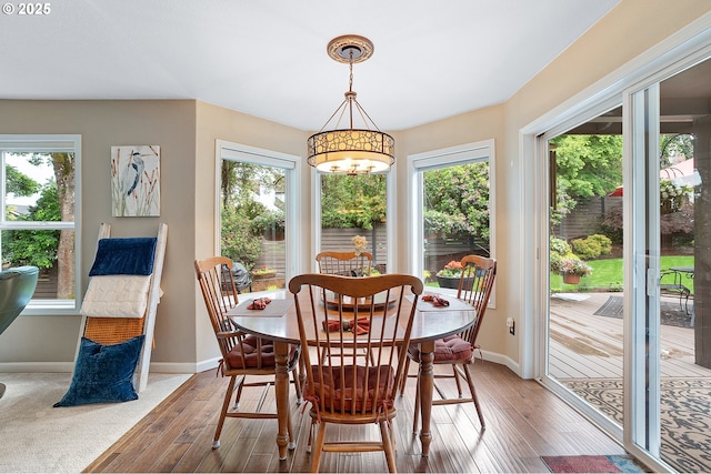 15137 SW Peachtree Dr, Portland, OR 97224 - dining area featuring plenty of natural light and wood finished floors