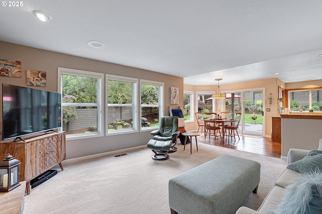 15137 SW Peachtree Dr, Portland, OR 97224 - carpeted living area with baseboards and recessed lighting