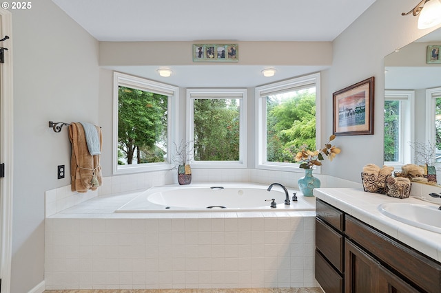 15137 SW Peachtree Dr, Portland, OR 97224 - full bathroom featuring vanity, a jetted tub, and plenty of natural light