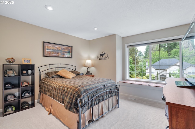 15137 SW Peachtree Dr, Portland, OR 97224 - bedroom with light carpet and recessed lighting