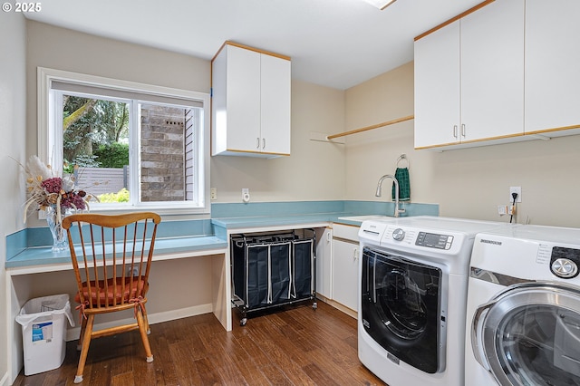 15137 SW Peachtree Dr, Portland, OR 97224 - laundry room featuring cabinet space, dark wood-style flooring, washing machine and dryer, and a desk
