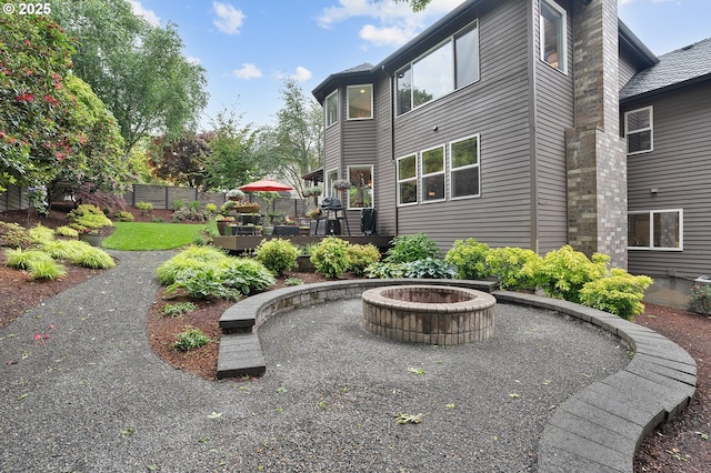 15137 SW Peachtree Dr, Portland, OR 97224 - view of patio / terrace with an outdoor fire pit and a wooden deck