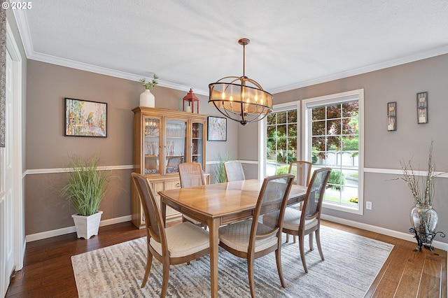 15137 SW Peachtree Dr, Portland, OR 97224 - dining area featuring a chandelier, dark wood-style flooring, and crown molding