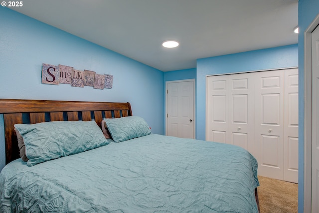 bedroom featuring a closet and carpet