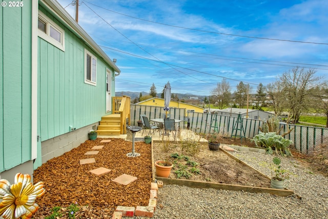 view of yard featuring a patio and a fenced backyard