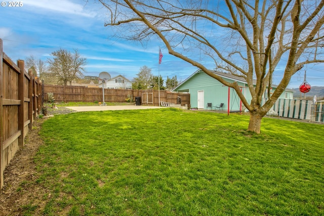 view of yard with a patio and a fenced backyard