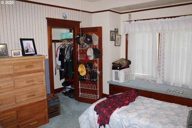 carpeted bedroom featuring wallpapered walls