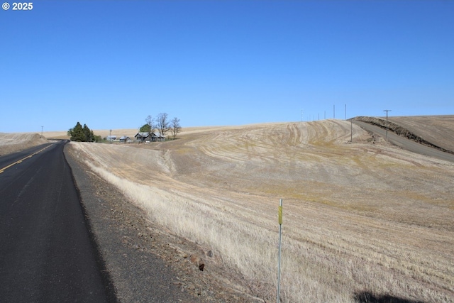 view of road featuring a rural view