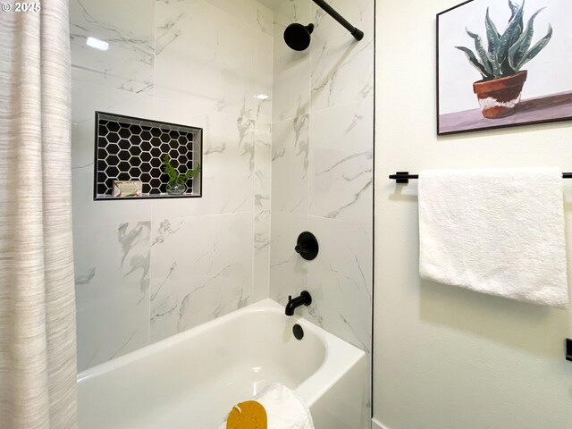 bathroom featuring shower / tub combo with curtain