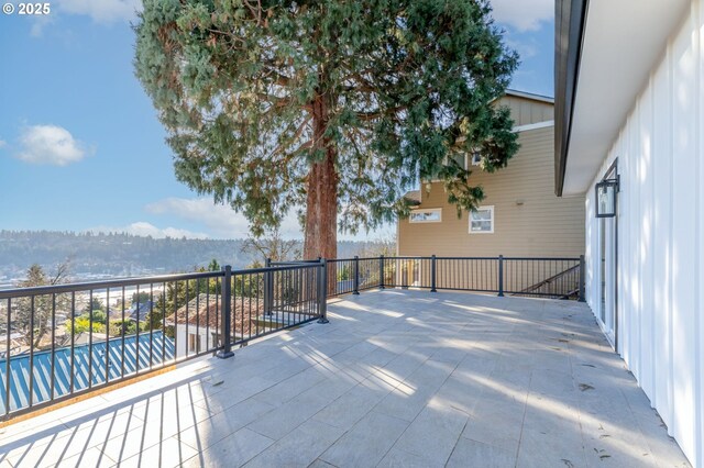 view of patio with a balcony