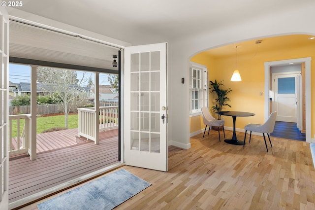 doorway with hardwood / wood-style floors