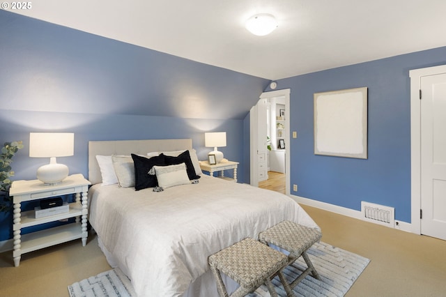 bedroom with vaulted ceiling